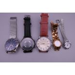 A bag of five wristwatches.