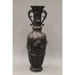 A late 19th century Japanese bronze vase. 50 cm high.