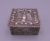 A small Continental silver box with gilded interior. 4 cm wide.
