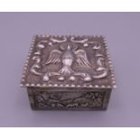 A small Continental silver box with gilded interior. 4 cm wide.