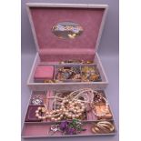 A box of miscellaneous costume jewellery.