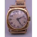 A 9 ct gold gentleman's wristwatch. 39.9 grammes total weight.