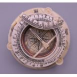 A bone compass. 10.25 cm diameter.