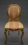 A 19th century upholstered carved giltwood salon chair. 45 cm wide.