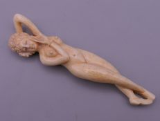 A bone nude medical figure. 8 cm long.