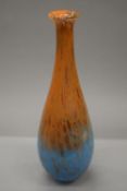 An orange and blue glass vase with gold flecks. 53.5 cm high.