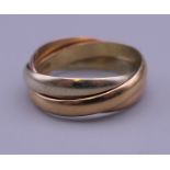 A 9 ct gold three coloured Russian wedding ring. Ring size J. 3.6 grammes.