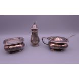 A silver three-piece cruet set. 233.2 grammes.