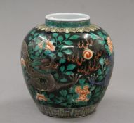 A Chinese famille verte vase. 17 cm high.