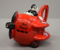 A Carlton Ware Red Baron teapot. 21.5 cm long.