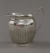 A Victorian silver cream jug. 10 cm high. 159.6 grammes.