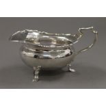 A silver cream jug. 7 cm high. 142.5 grammes.