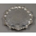 A Victorian engraved silver salver. 30 cm wide. 784.1 grammes.