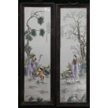 A pair of framed Chinese porcelain plaques. 79 cm high.