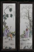 A pair of framed Chinese porcelain plaques. 79 cm high.