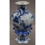 A 19th century Delft blue and white porcelain vase. 24.5 cm high.