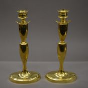 A pair of large 1930's brass candlesticks. 41 cm high.
