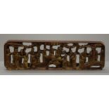 A Chinese carved wooden figural plaque. 33.5 cm long.