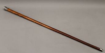 A Victorian silver handled sword stick with blued blade. 93.5 cm long.
