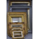 A quantity of vacant picture frames. The largest pair 90 x 64 cm overall, two smallest 22 x 27 cm.