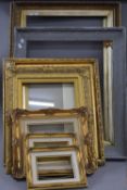 A quantity of vacant picture frames. The largest pair 90 x 64 cm overall, two smallest 22 x 27 cm.