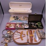 A box of costume jewellery.