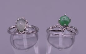 Two silver and jade rings.