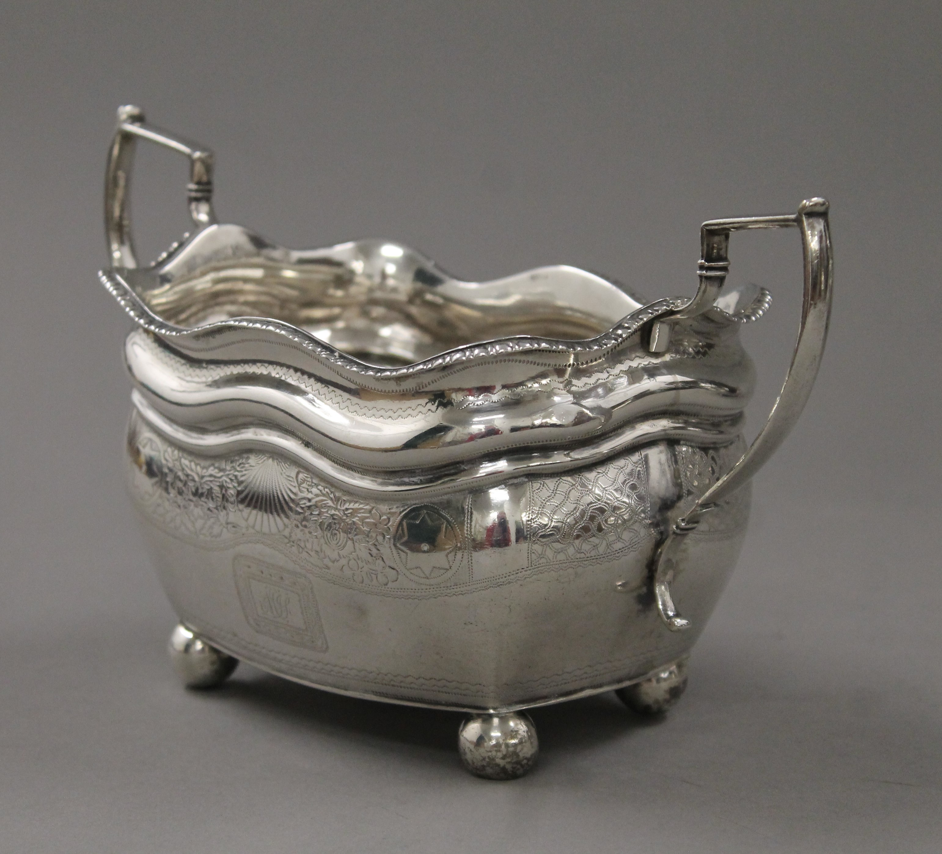 A Georgian Irish silver teapot and associated sugar bowl. The former 17 cm high. 918. - Image 9 of 14