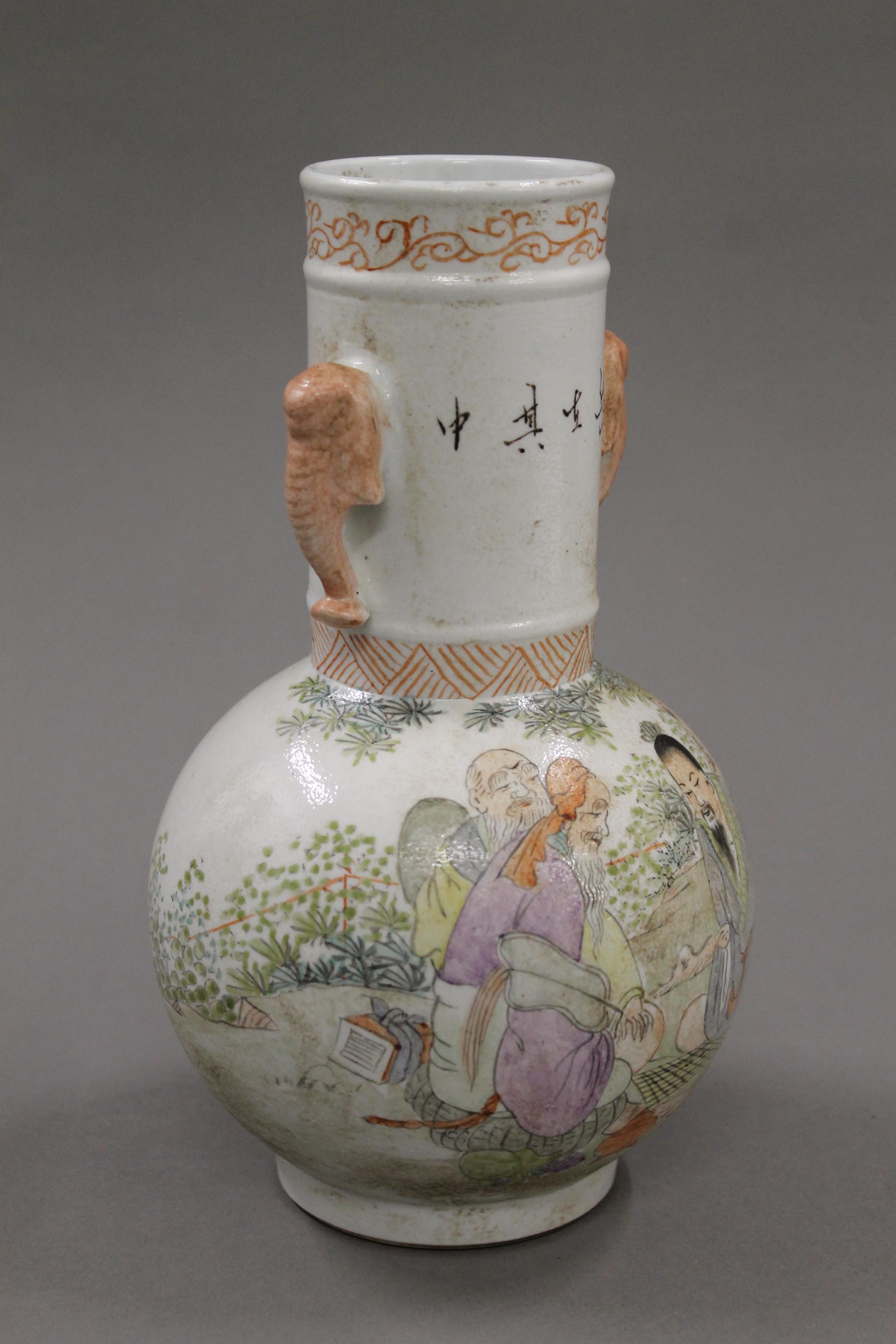 A small Chinese coloured porcelain vase decorated with figures. 23.5 cm high. - Image 2 of 5