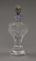 A sterling silver and enamel mounted cut glass scent bottle with silver plated stopper. 21 cm high.
