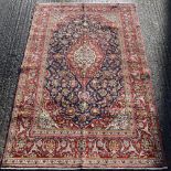 A Kashan rug. 250 x 145 cm.