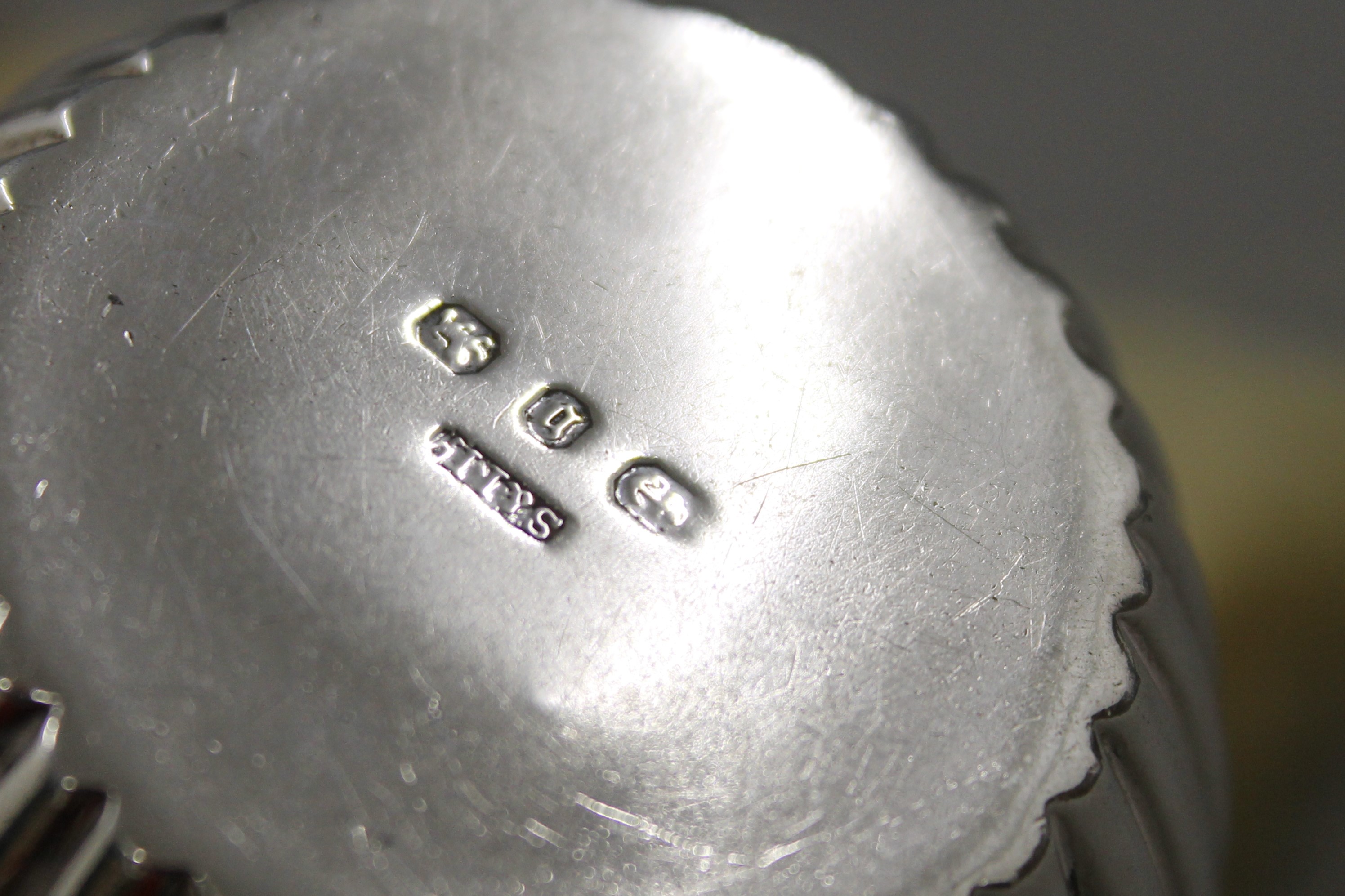 A small silver cream jug (53 grammes) and a silver handled crumb brush. The former 6.5 cm high. - Image 5 of 8