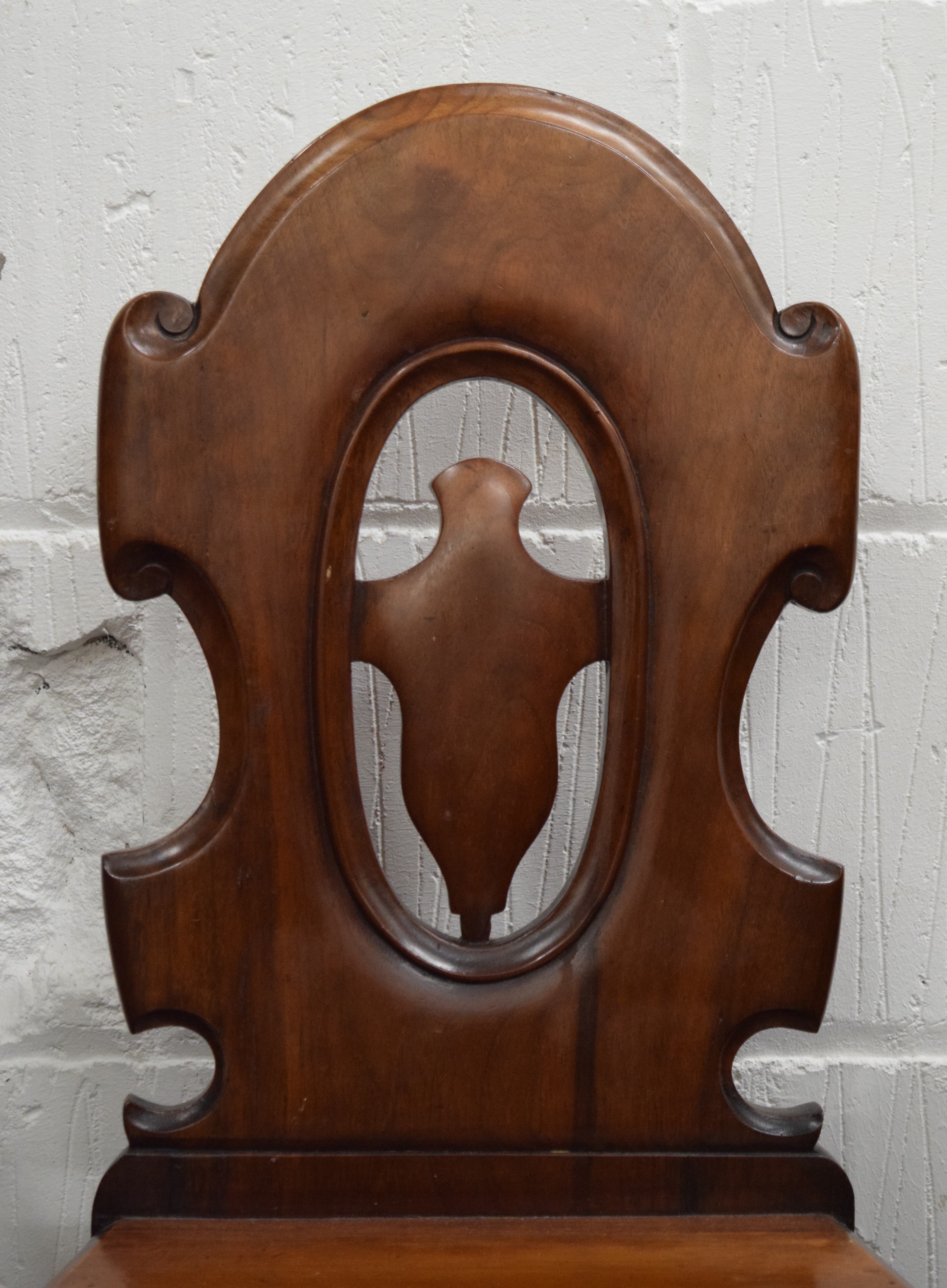 A Victorian mahogany hall chair. - Image 2 of 4