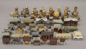 A quantity of Wade Nursery Rhyme figures, Whimsey-On-Why Cottages, etc.