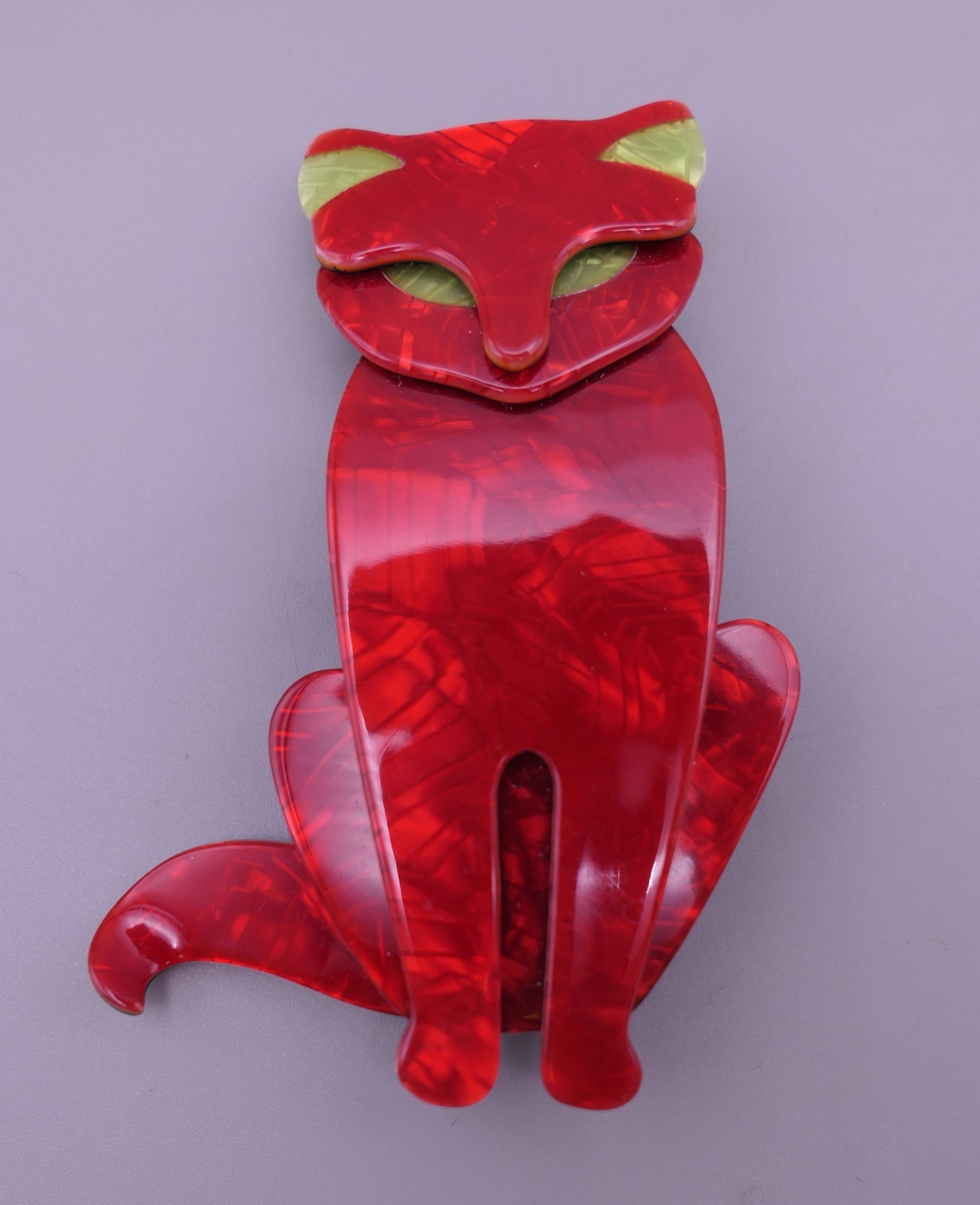 A Lea Stein cat brooch. 8 cm high.