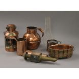 A box of copper items.