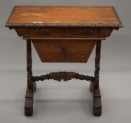 A 19th century Anglo-Indian work table. 76 cm wide.