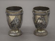 A pair of Danish shot cups decorated with ships. 6 cm high.