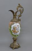 A Continental metal mounted painted glass ewer. 58 cm high.