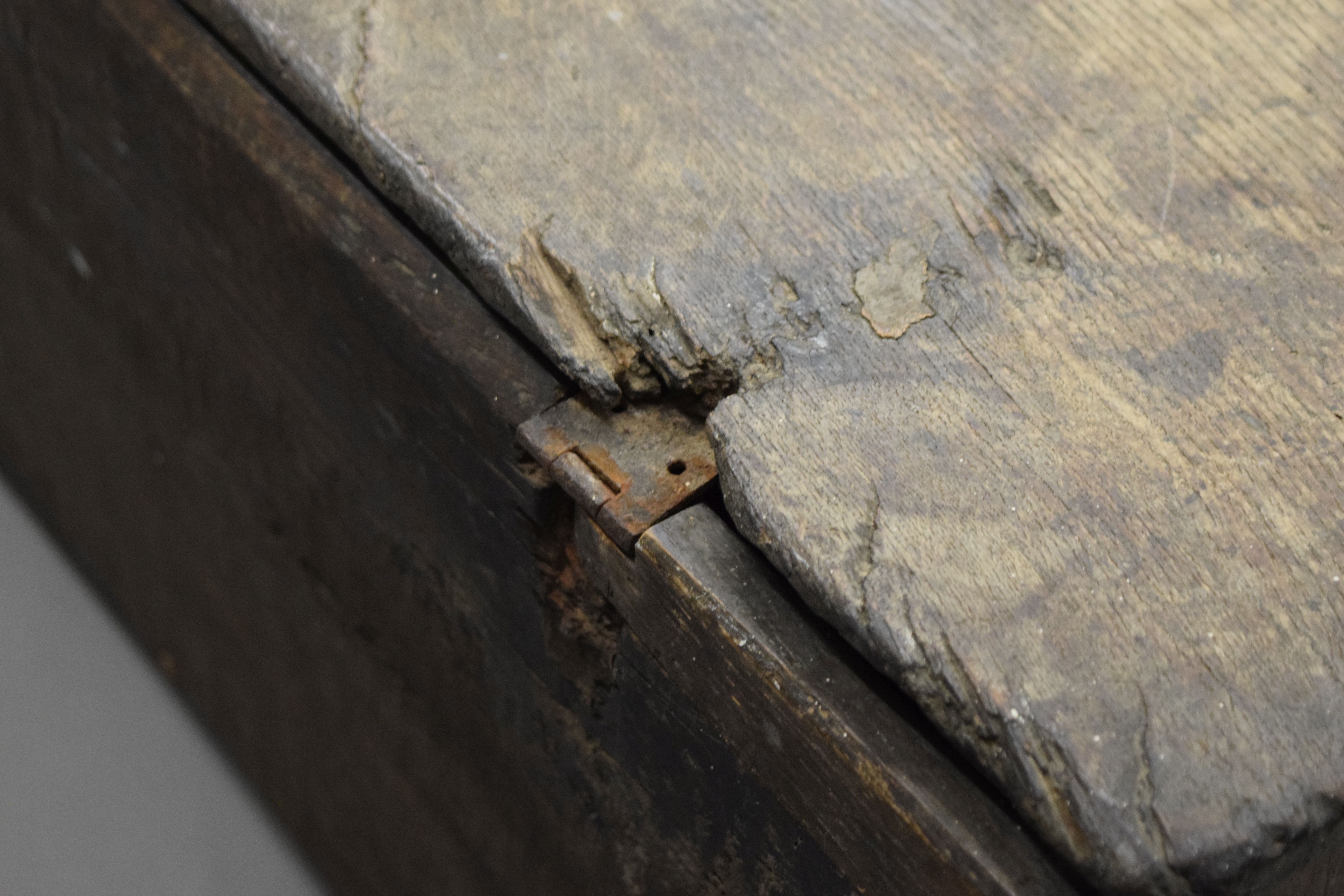 A small early 17th century oak six plank coffer. 90 cm long. - Image 7 of 7