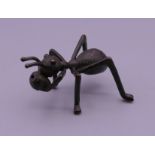 A bronze model of an ant. 5.5 cm long.
