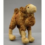 A plush covered camel, possibly Steiff. 30.5 cm high.