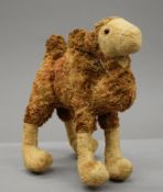 A plush covered camel, possibly Steiff. 30.5 cm high.