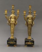 A pair of gilt bronze Empire style candelabra. 44.5 cm high.