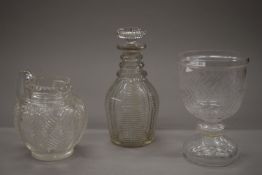 A cut glass celery vase, a cut glass decanter and a cut glass jug. The former 20.