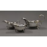 Two silver sauce boats and a larger plated example. The latter 19.5 cm long. 176.