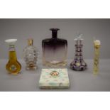 A collection of various scent/perfume bottles.