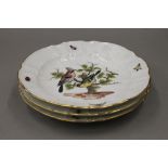 Three Meissen porcelain plates painted with birds and insects. 23 cm diameter.