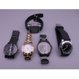 A bag of five wristwatches.