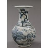 A small Chinese blue and white porcelain vase. 14 cm high.